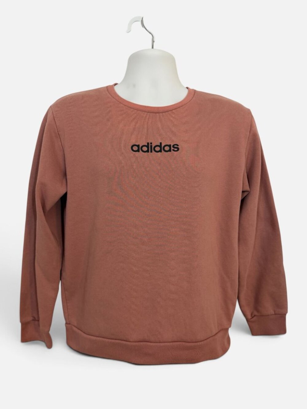 The adidas Essentials Women's Pink Crewneck Logo Graphic Sweatshirt in size L of